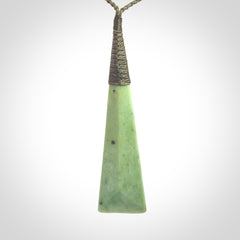 One only larger sized New Zealand jade drop pendant. Hand carved in New Zealand by Donna Summers, jade artist, for NZ Pacific. Provided with Khaki adjustable cord.