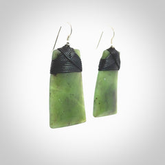 Hand crafted large, New Zealand Jade toki earrings with Sterling Silver Hooks. Jade toki earrings, packaged in a woven kete pouch.
