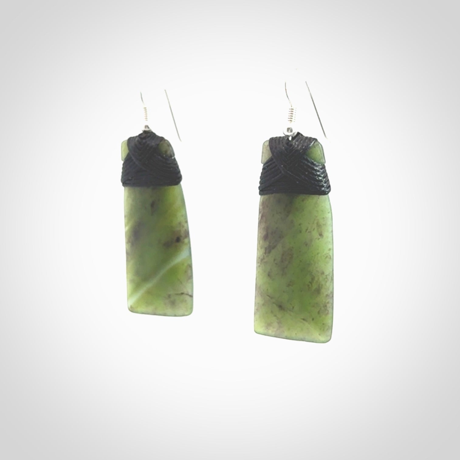 Hand crafted large, New Zealand Jade toki earrings with Sterling Silver Hooks. Jade toki earrings, packaged in a woven kete pouch.