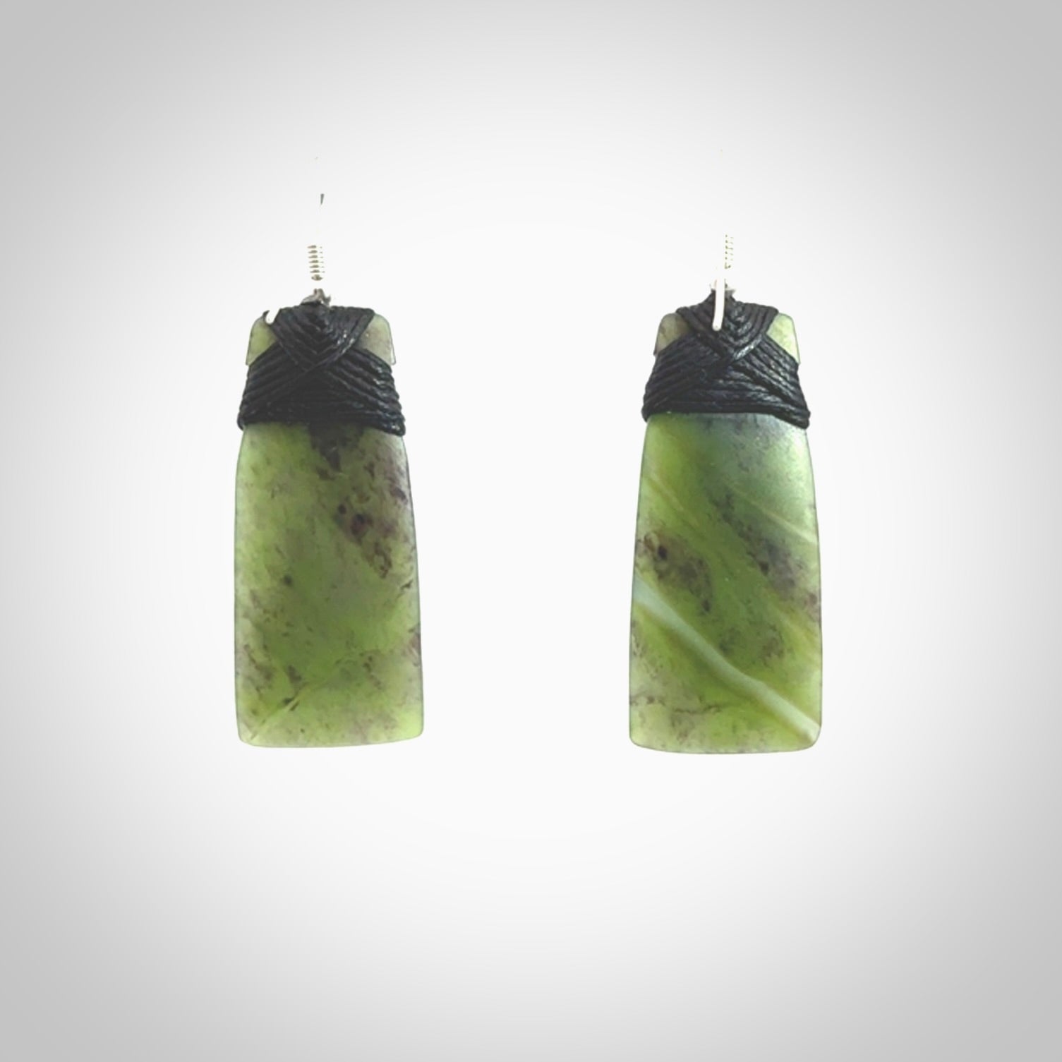 Hand crafted large, New Zealand Jade toki earrings with Sterling Silver Hooks. Jade toki earrings, packaged in a woven kete pouch.