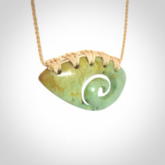 Hand carved contemporary flower jade koru jewellery. Made by Donna Summers for NZ Pacific from New Zealand greenstone.