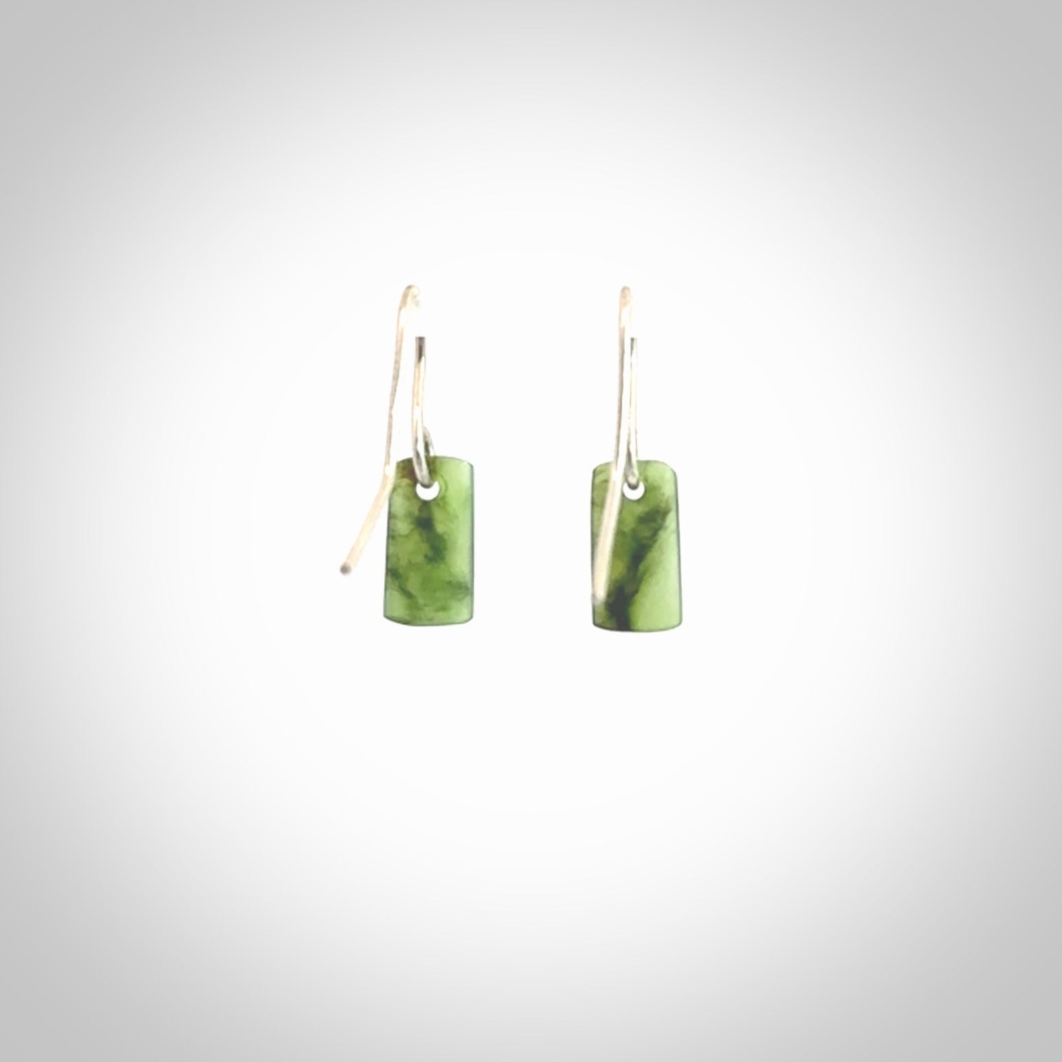 Hand carved small New Zealand jade drop earrings. Made by NZ Pacific from real jade. Online jewellery for sale online by NZ Pacific. Hand carved here in New Zealand by Ric Moor.