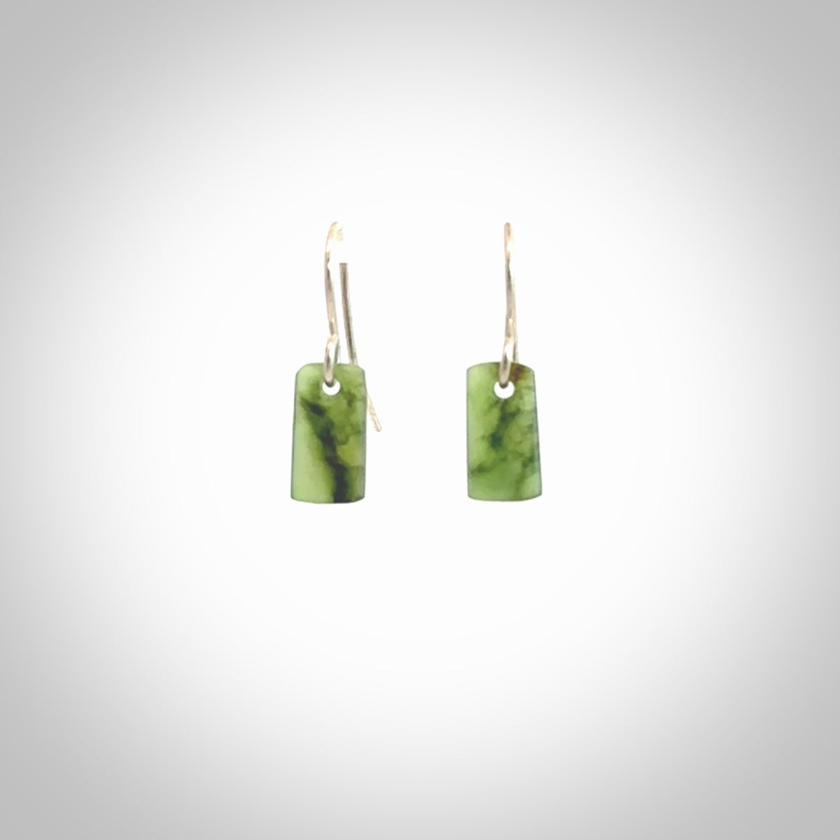 Hand carved small New Zealand jade drop earrings. Made by NZ Pacific from real jade. Online jewellery for sale online by NZ Pacific. Hand carved here in New Zealand by Ric Moor.