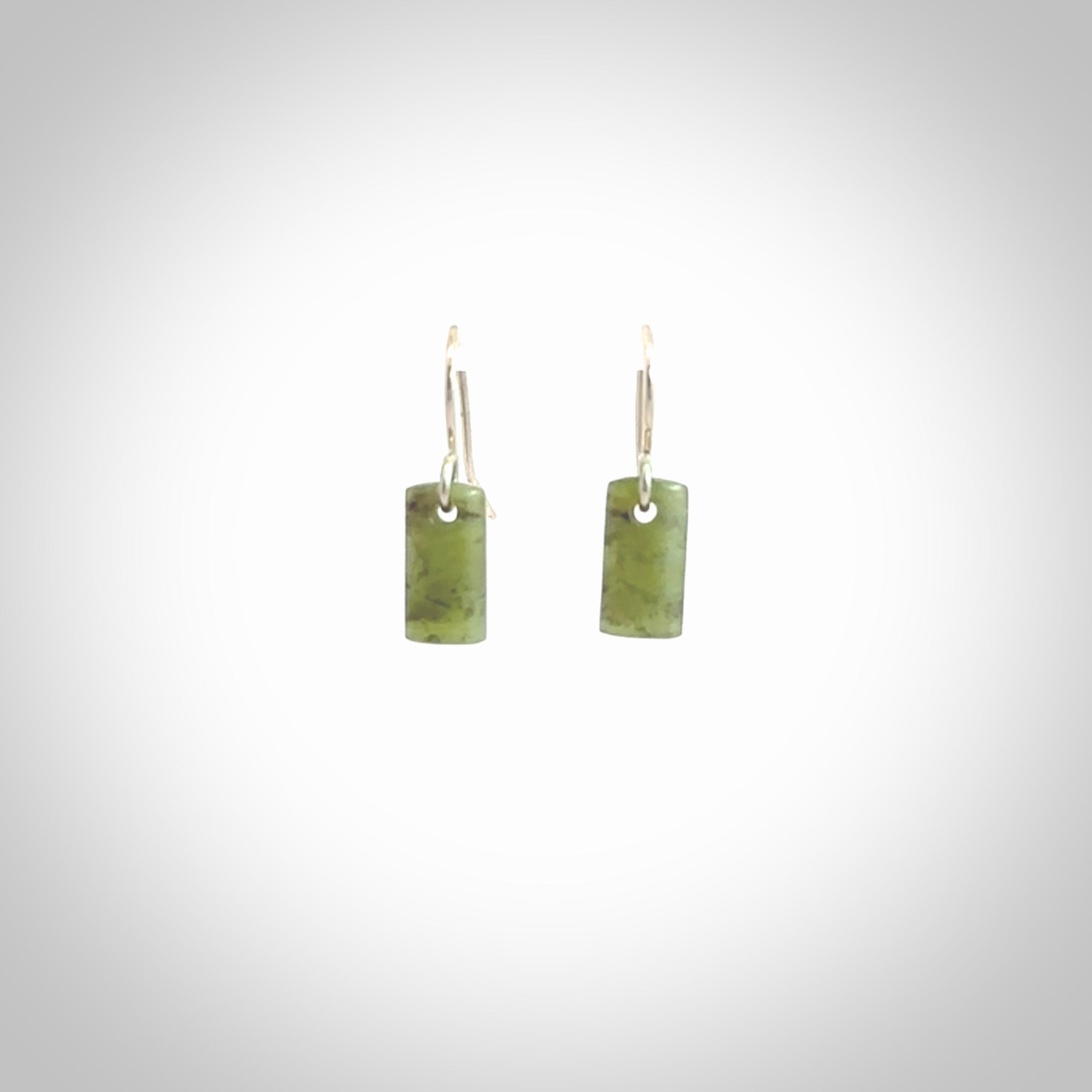 Hand carved small New Zealand jade drop earrings. Made by NZ Pacific from real jade. Online jewellery for sale online by NZ Pacific. Hand carved here in New Zealand by Ric Moor.