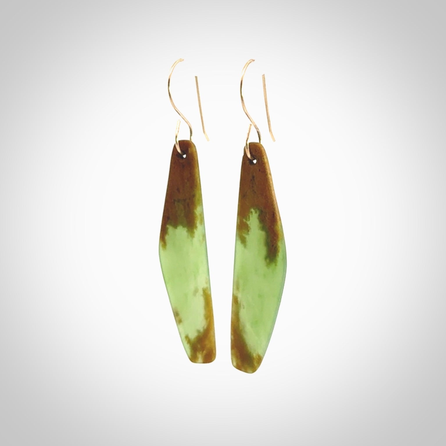 Hand carved large New Zealand Flower jade drop earrings. Made by NZ Pacific from real jade. Online jewellery for sale online by NZ Pacific. Hand carved here in New Zealand.