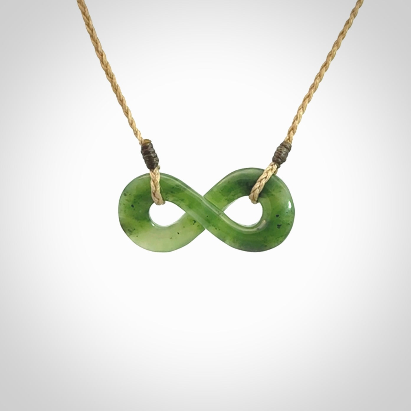 Eternity symbol pendant in jade