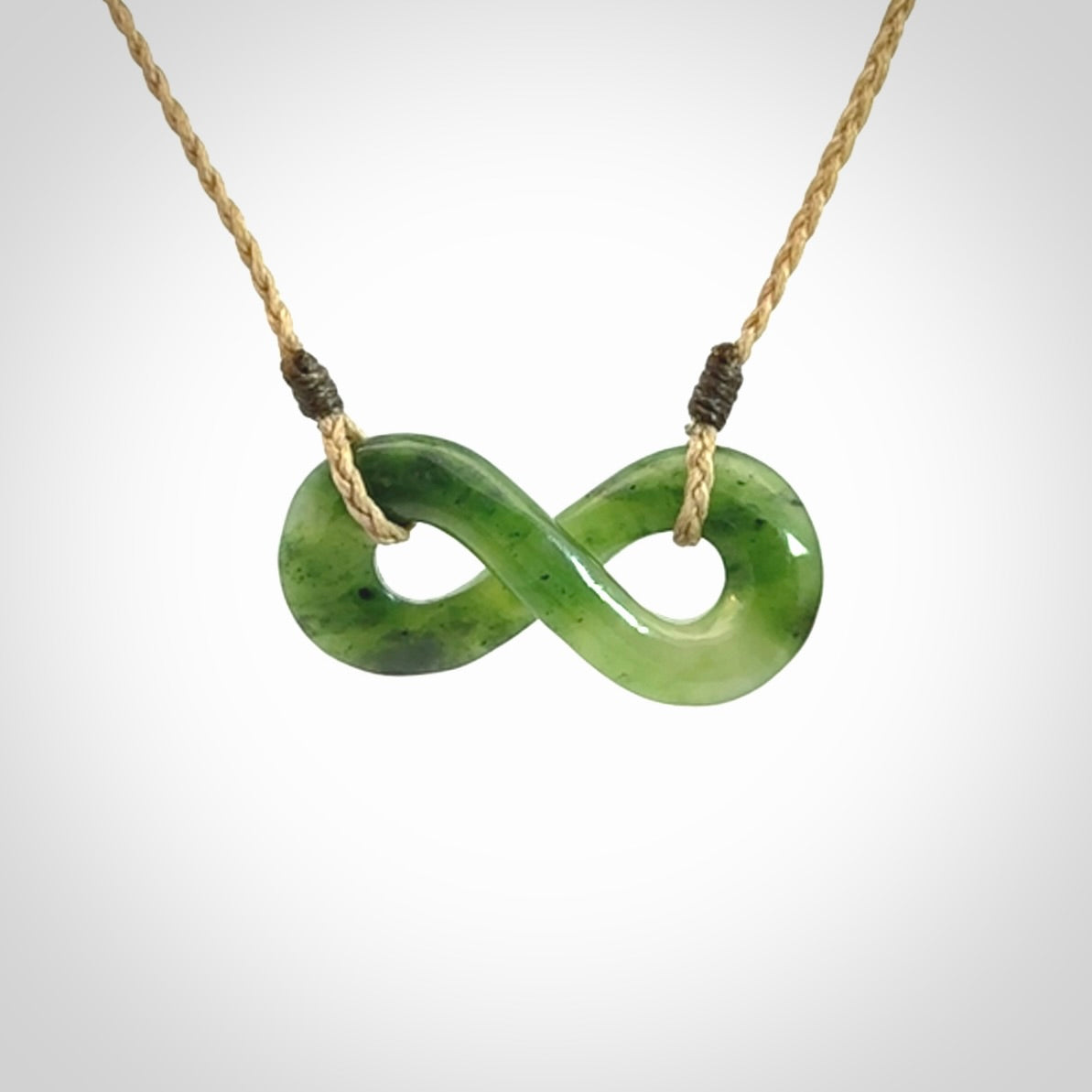 Eternity symbol pendant in jade