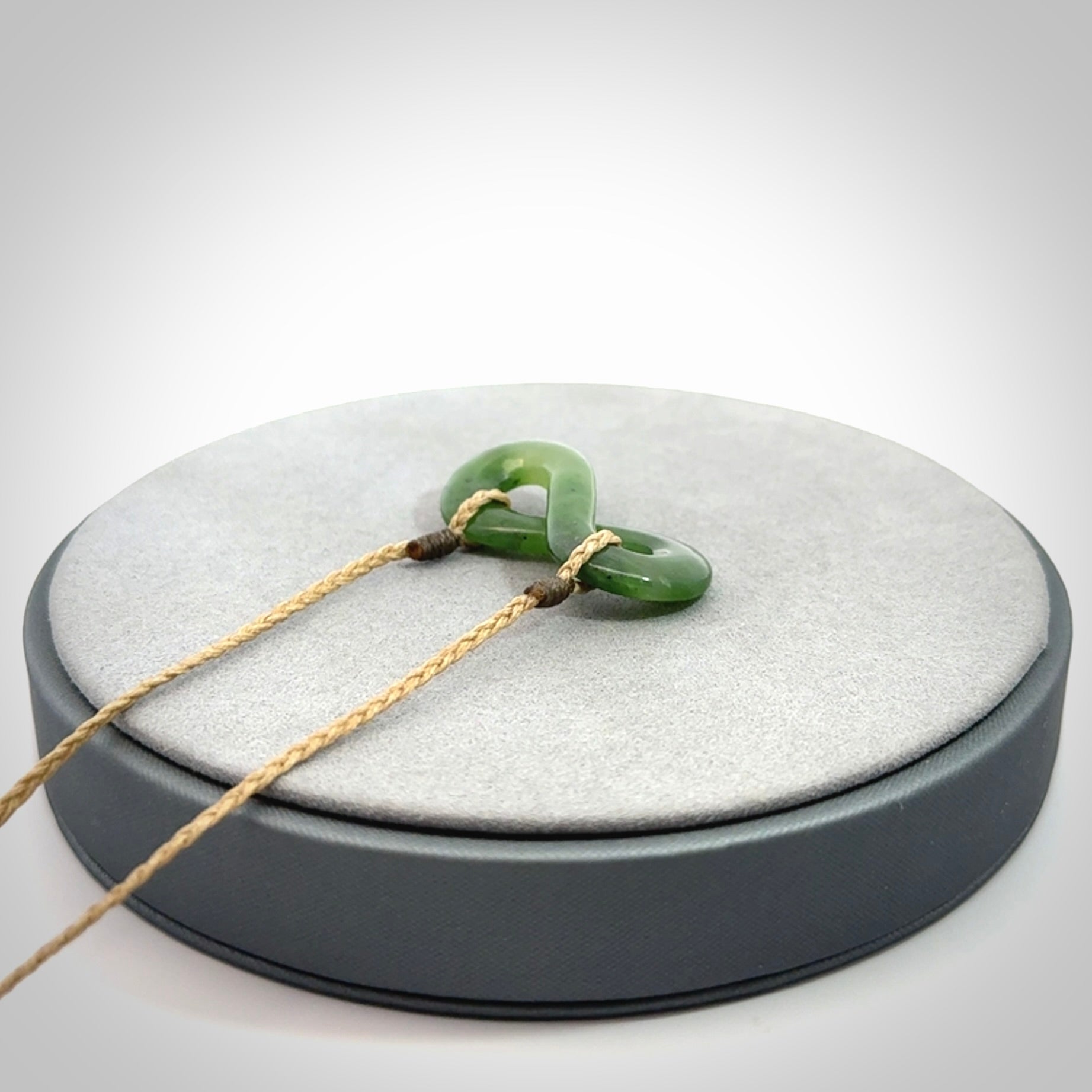 Eternity symbol pendant in jade