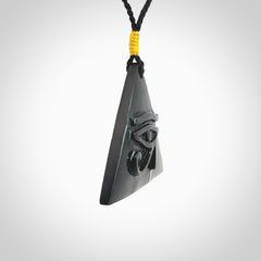 An Egyptian Eye of Ra pyramid pendant, hand made for us from Australian Black Jade. This pendant is provided with an adjustable black cord.
