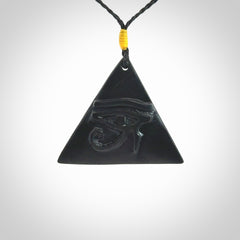 An Egyptian Eye of Ra pyramid pendant, hand made for us from Australian Black Jade. This pendant is provided with an adjustable black cord.