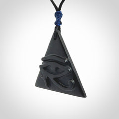 An Egyptian Eye of Horus pyramid pendant, hand made for us from Australian Black Jade. This pendant is provided with an adjustable black cord.
