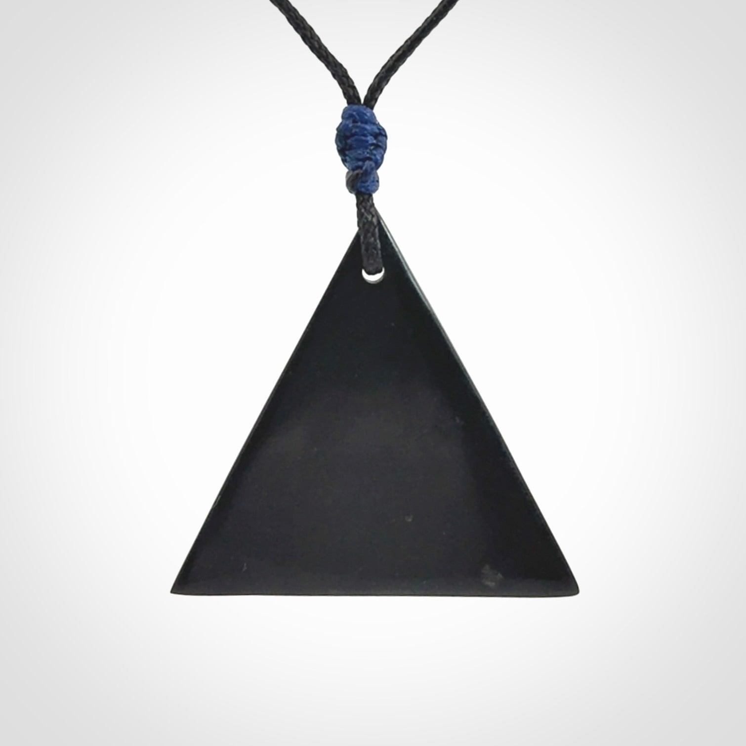 An Egyptian Eye of Horus pyramid pendant, hand made for us from Australian Black Jade. This pendant is provided with an adjustable black cord.