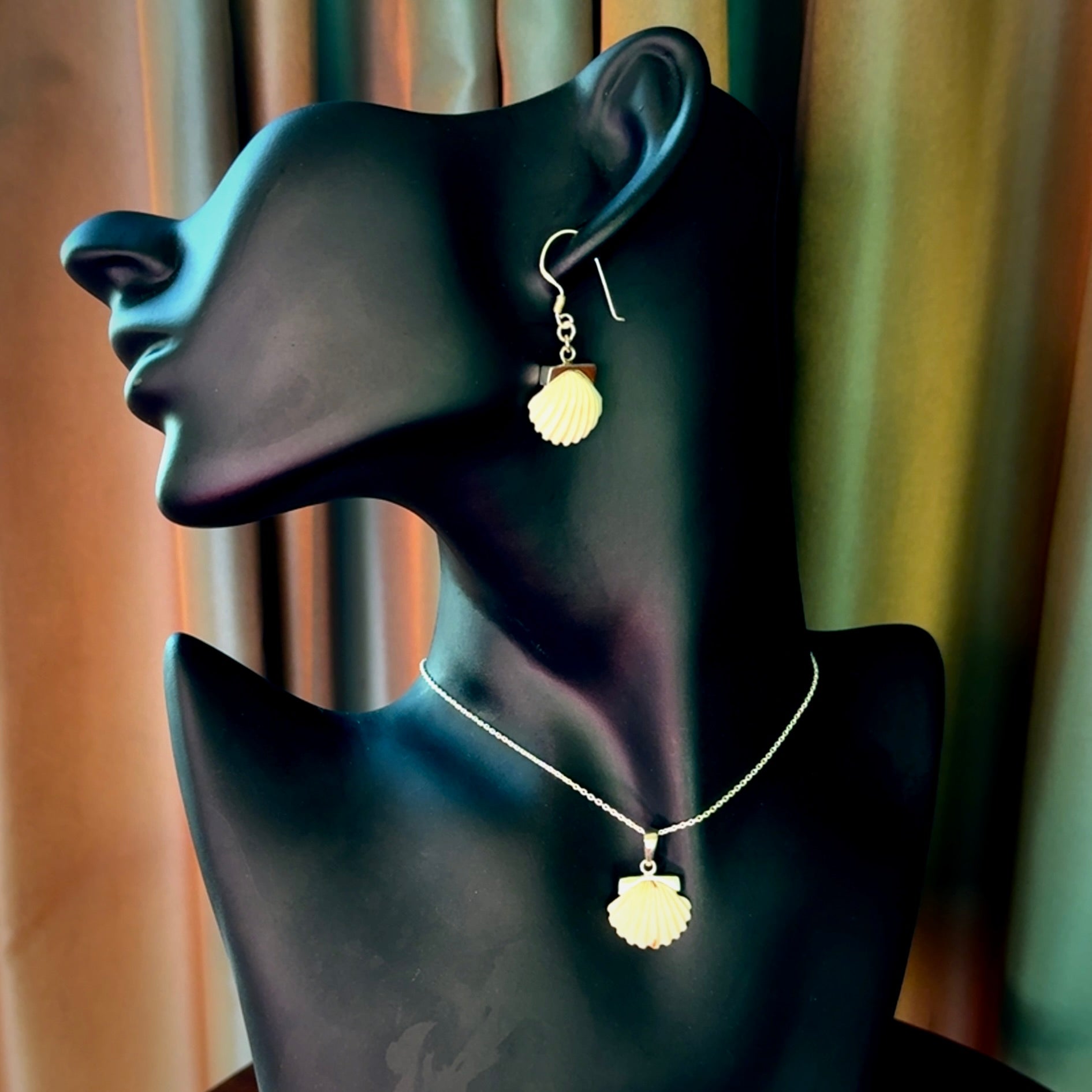 Hand made woolly mammoth tusk fanshell earrings and matching pendant with Sterling Silver.
