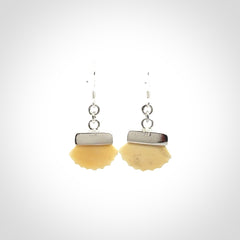 Hand made woolly mammoth tusk fanshell earrings with Sterling Silver. Mammoth tusk fanshell earrings with Sterling silver. Made by NZ Pacific and sale online only.