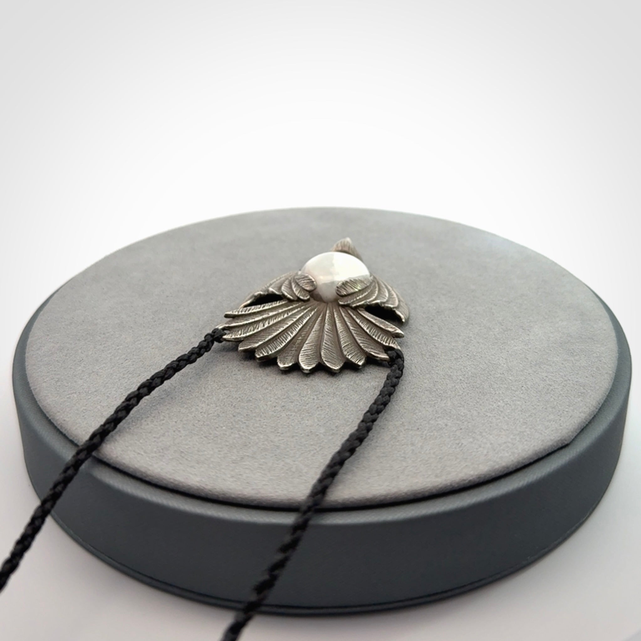 Silver and White Jade Fantail Pendant