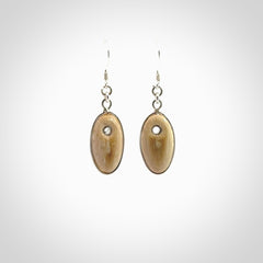 Hand carved woolly mammoth tusk earrings. Hand made by NZ Pacific for sale online.