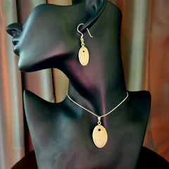 Hand carved woolly mammoth tusk earrings and matching pendant