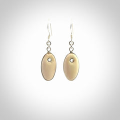 Hand carved woolly mammoth tusk earrings. Hand made by NZ Pacific for sale online.
