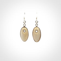 Hand carved woolly mammoth tusk earrings. Hand made by NZ Pacific for sale online.
