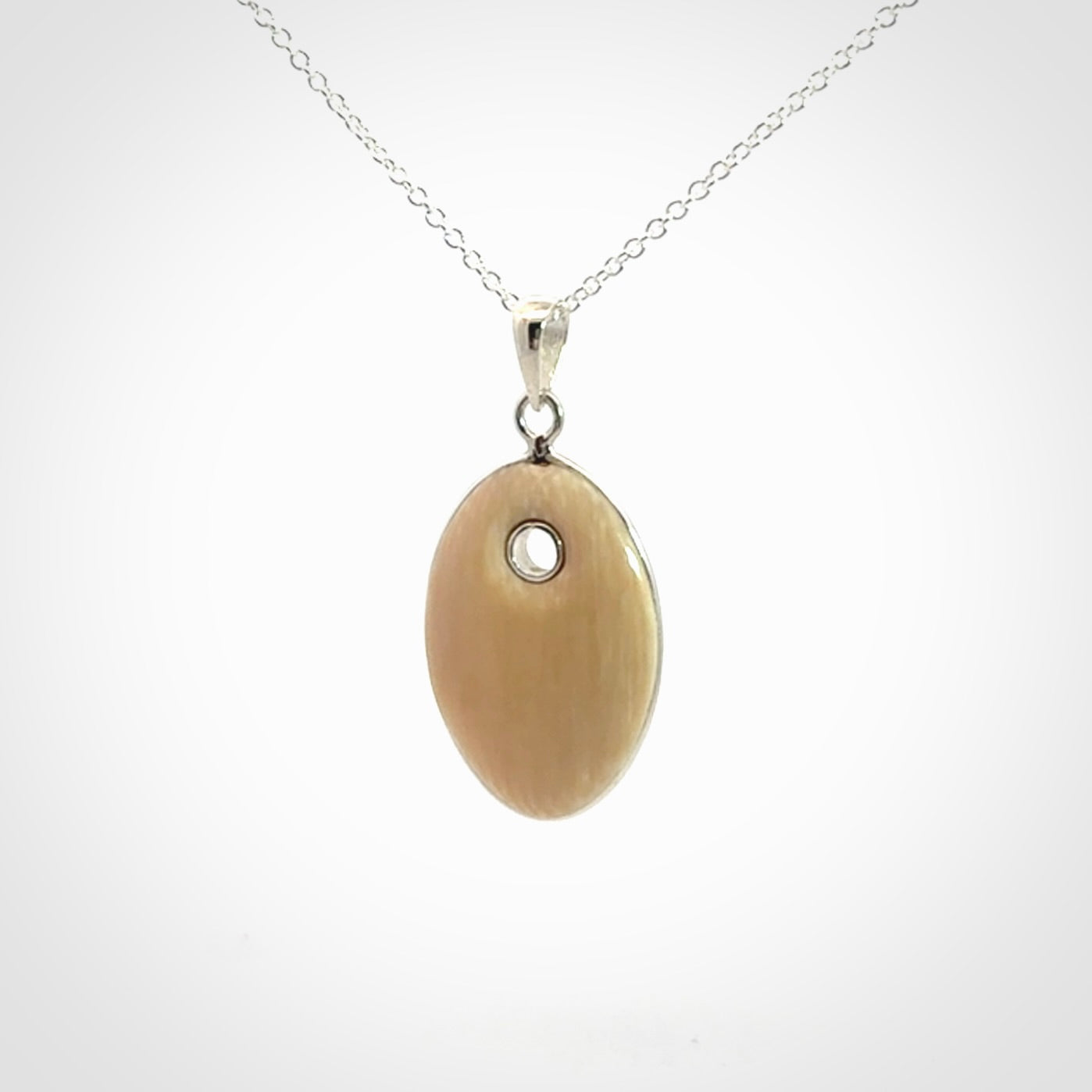 Hand carved woolly mammoth tusk pendant