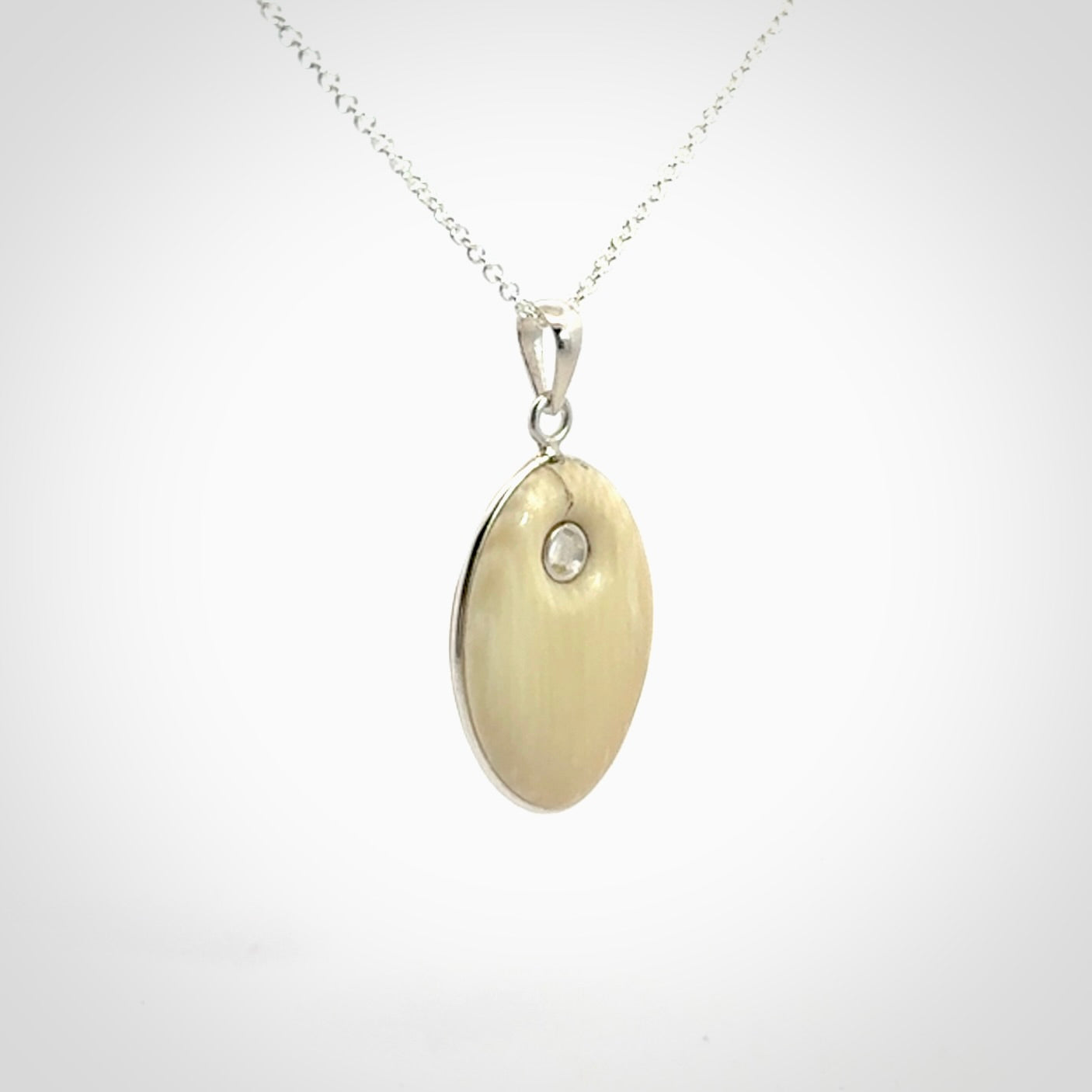 Hand carved woolly mammoth tusk pendant