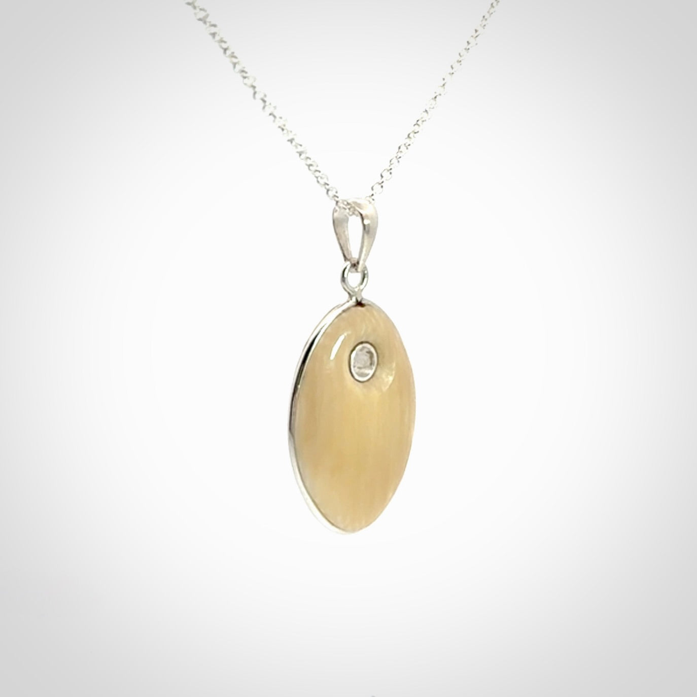 Hand carved woolly mammoth tusk pendant