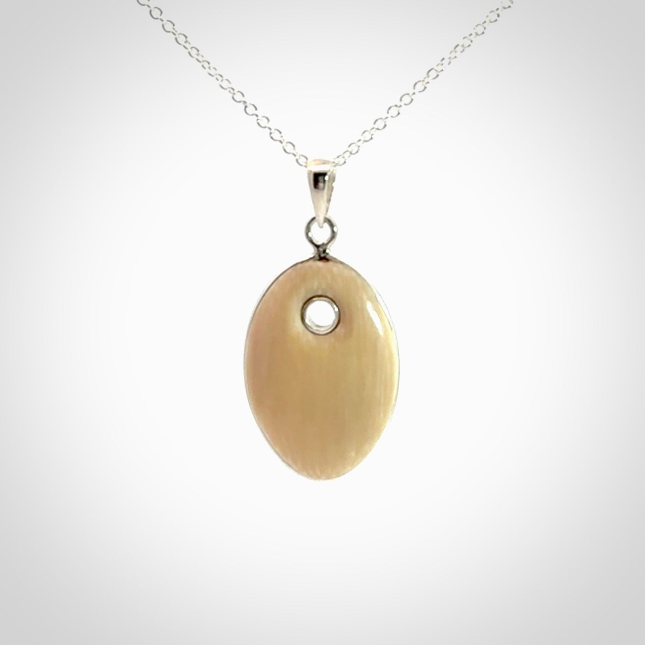 Hand carved woolly mammoth tusk pendant