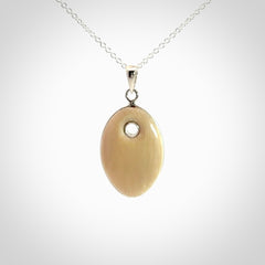 Hand carved woolly mammoth tusk pendant