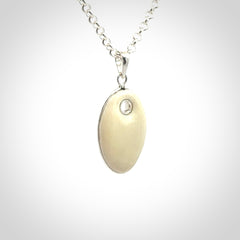 Hand carved woolly mammoth tusk pendant
