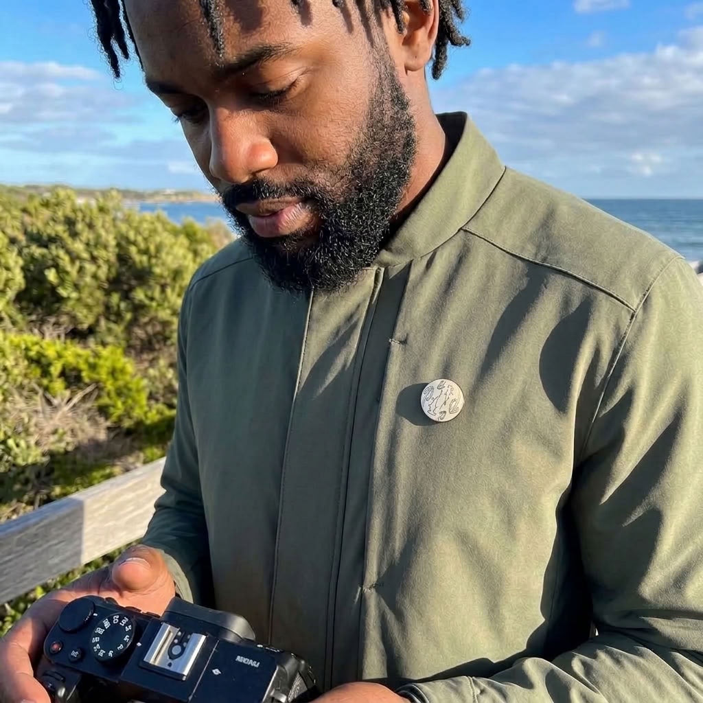 Man wearing bone lapel pin
