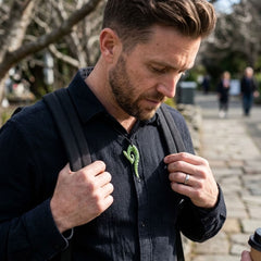 Man wearing a jade pendant