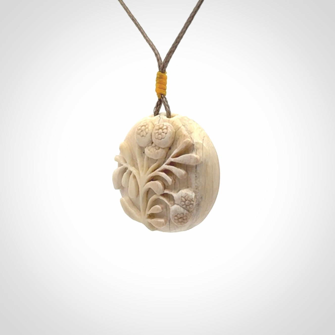 Flower pendant, Hand Carved in Woolly Mammoth Tusk