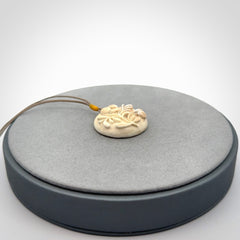 Flower pendant, Hand Carved in Woolly Mammoth Tusk