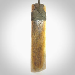 Hand carved Whale Bone Toki by Fumio Noguchi. One only New Zealand whale bone toki necklace for men and women. Unique New Zealand art to wear. Shipped to you on an adjustable cord.