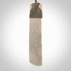 Hand carved Whale Bone Toki by Fumio Noguchi. One only New Zealand whale bone toki necklace for men and women. Unique New Zealand art to wear. Shipped to you on an adjustable cord.