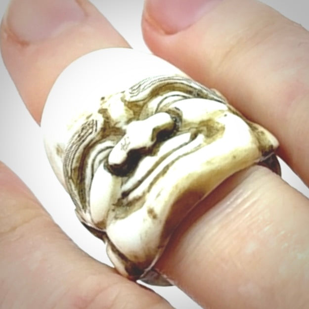 Hand carved Hotei good fortune ring. Made from Red Deer antler in New Zealand. Hand made from deer antler by master bone carver Fumio Noguchi. Spectacular collectable work of art, made to wear. One only ring, delivered to you with express courier.