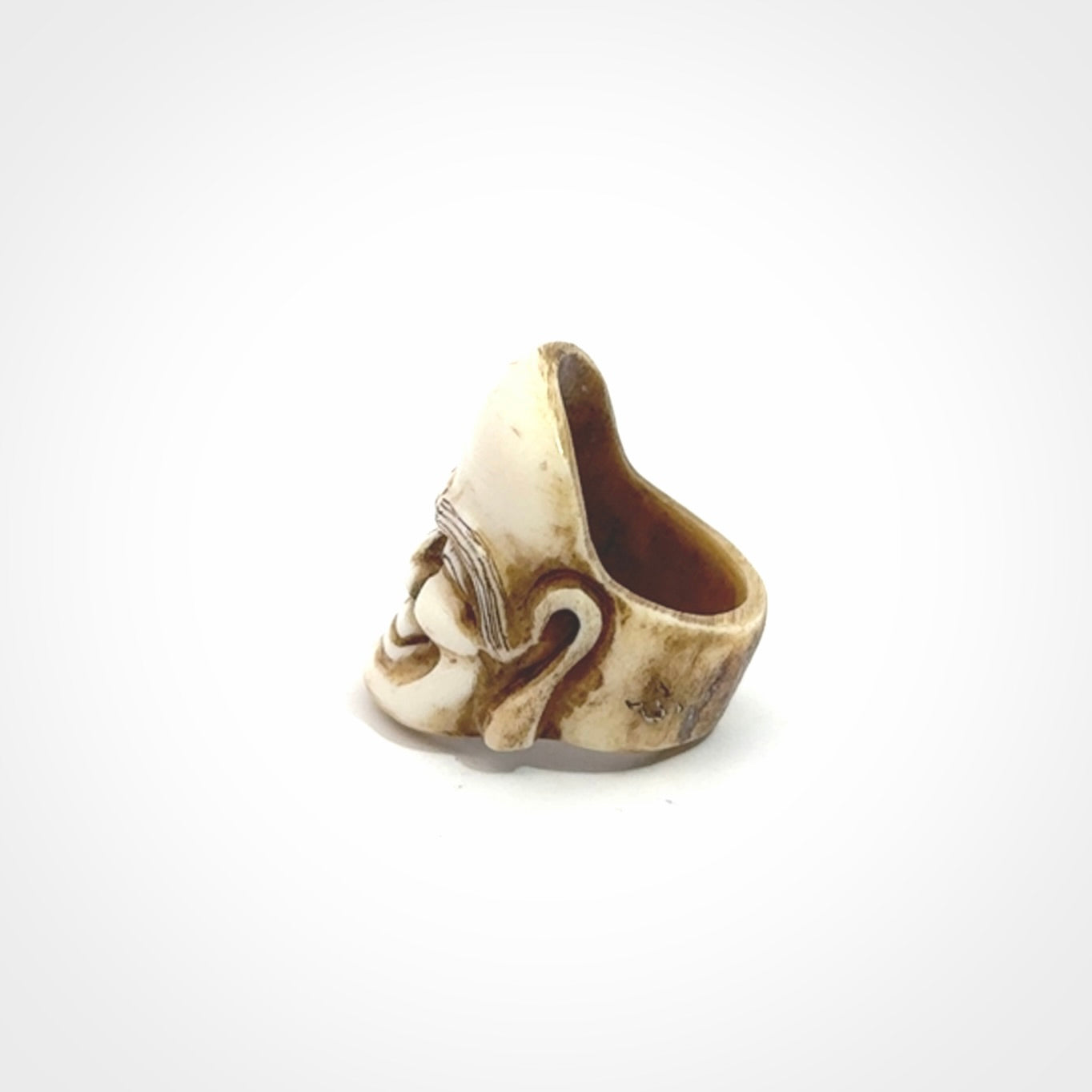 Hand carved Hotei good fortune ring. Made from Red Deer antler in New Zealand. Hand made from deer antler by master bone carver Fumio Noguchi. Spectacular collectable work of art, made to wear. One only ring, delivered to you with express courier.