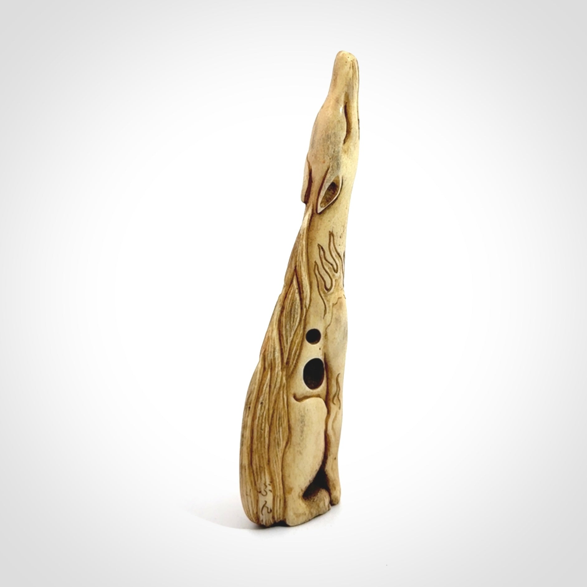 Hand carved incredible nine-tailed fox bone carving. A stunning work of art, beautifully replicating a nine-tailed fox. A one off collectors item that has been hand crafted to be worn or displayed.