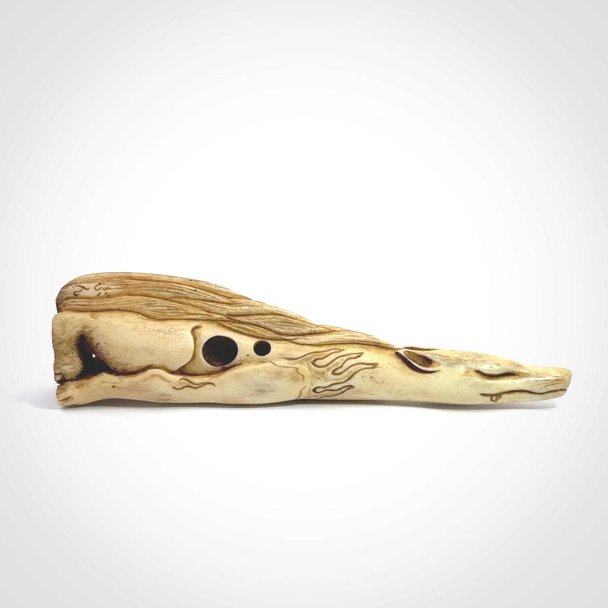 Hand carved incredible nine-tailed fox bone carving. A stunning work of art, beautifully replicating a nine-tailed fox. A one off collectors item that has been hand crafted to be worn or displayed.