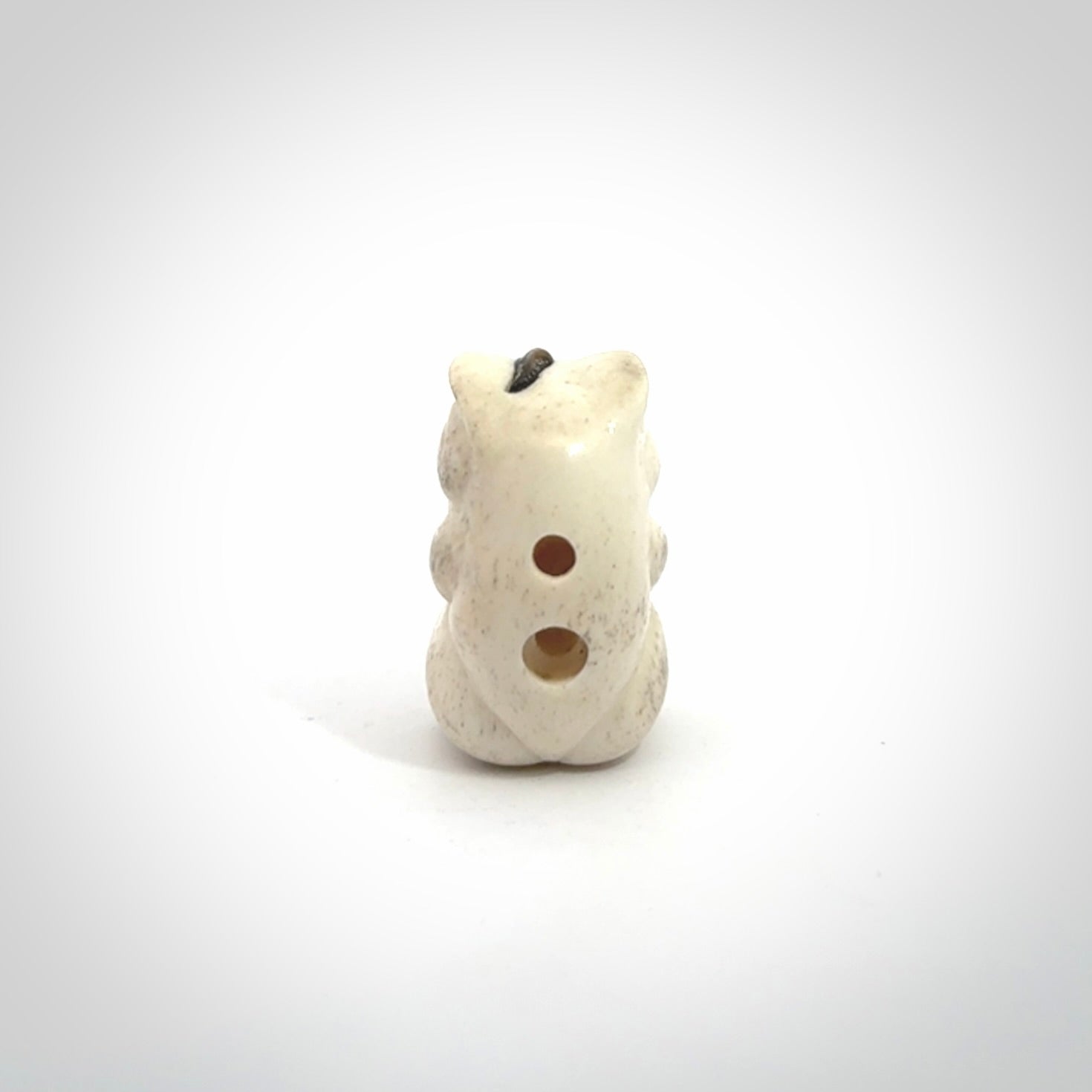 Hand carved meditating frog with slug on its head, made from Deer antler and black mother of pearl. Hand made by master bone carver Fumio Noguchi. Spectacular collectable work of art to display. One only, delivered to you at no extra cost with express courier.