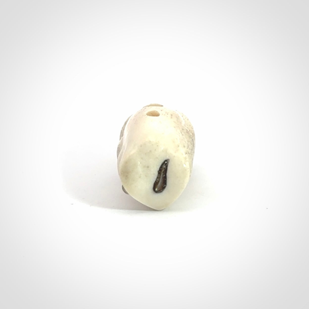 Hand carved meditating frog with slug on its head, made from Deer antler and black mother of pearl. Hand made by master bone carver Fumio Noguchi. Spectacular collectable work of art to display. One only, delivered to you at no extra cost with express courier.