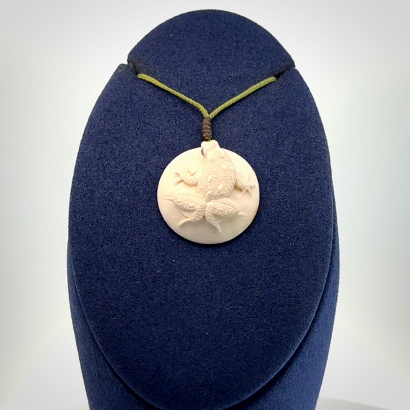 A Delightful Frog Pendant