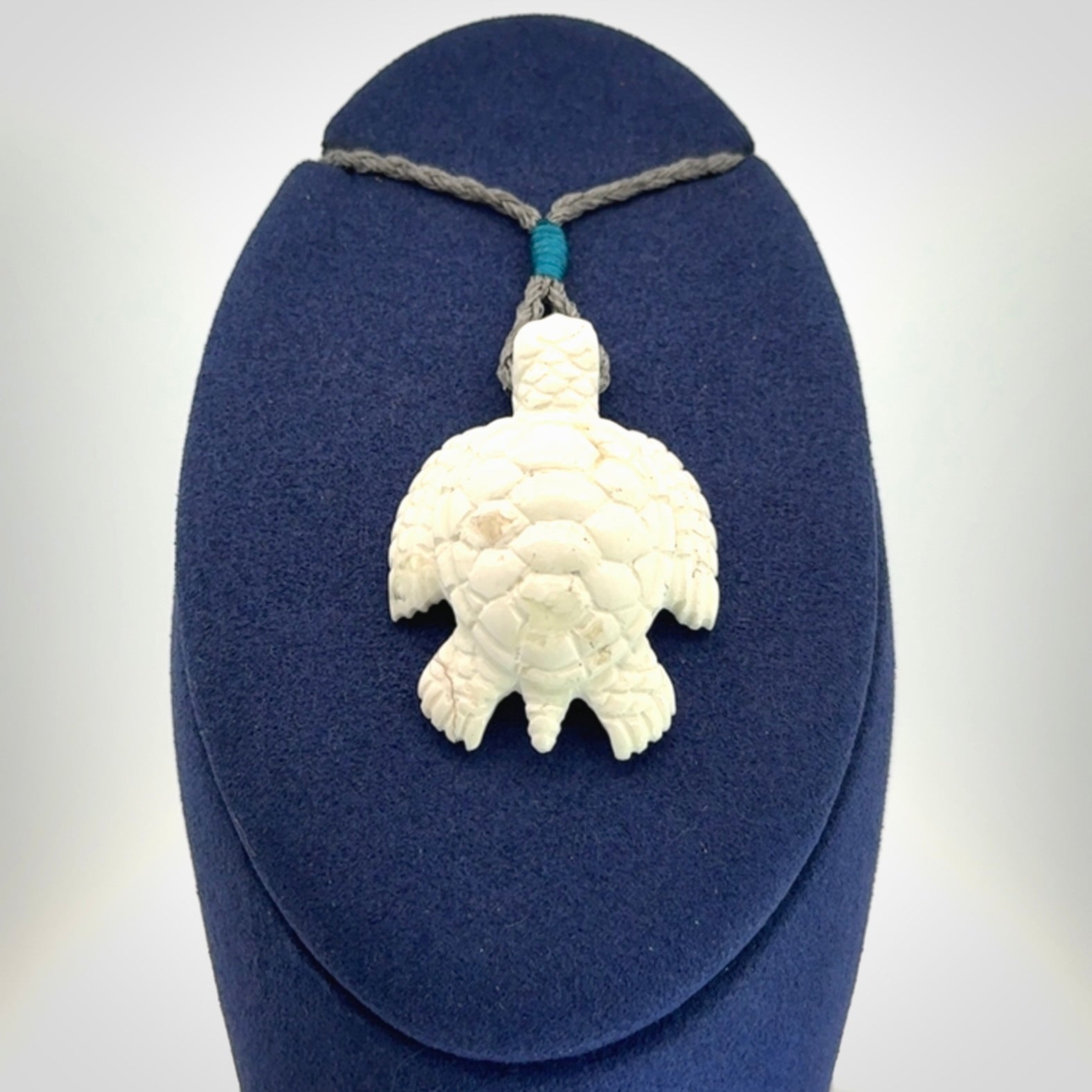 Hand carved white onyx turtle pendant. Unique handmade jewellery for sale online.