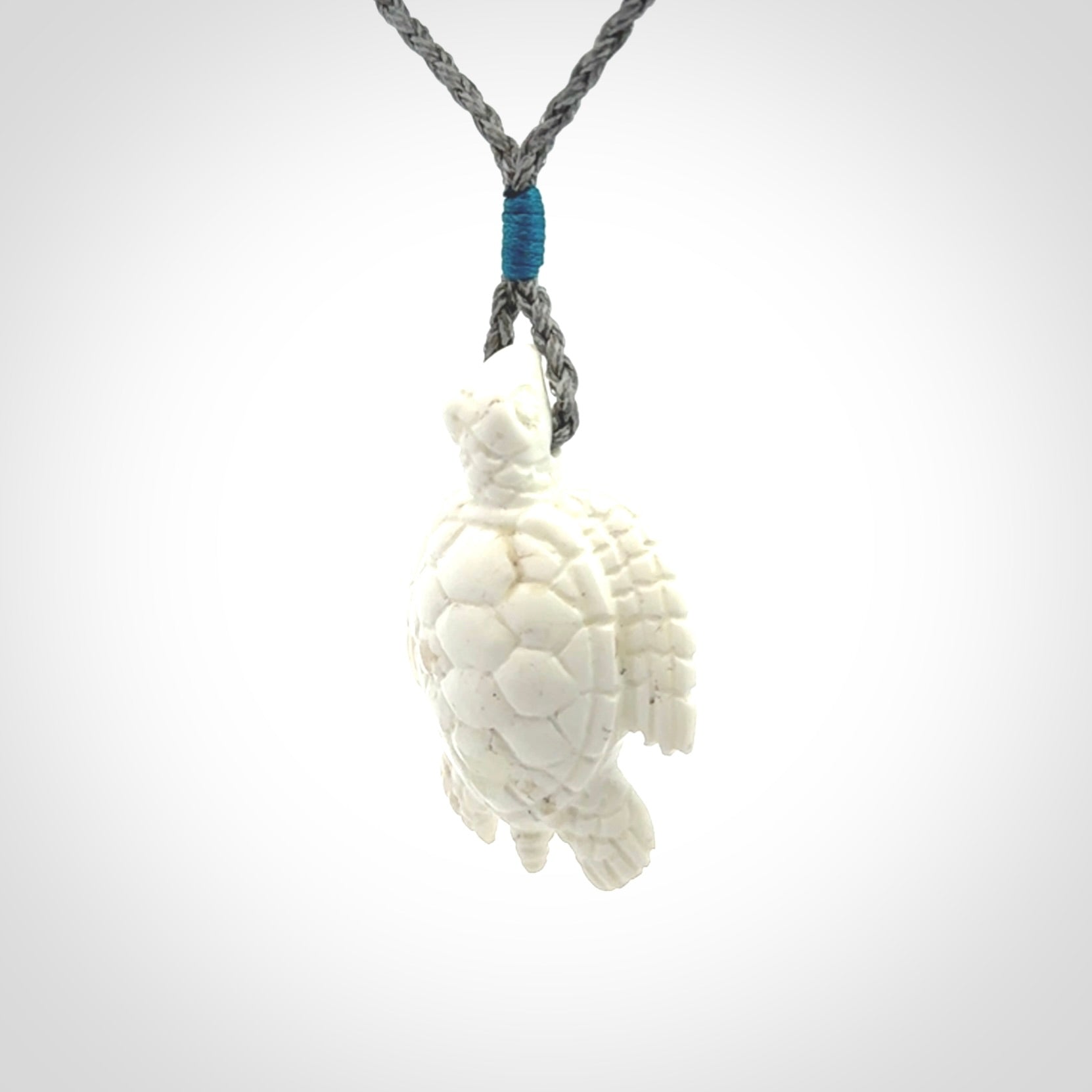 Hand carved white onyx turtle pendant. Unique handmade jewellery for sale online.