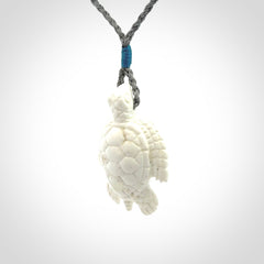 Hand carved white onyx turtle pendant. Unique handmade jewellery for sale online.