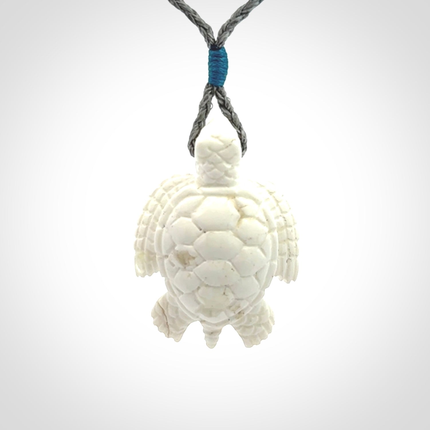Hand carved white onyx turtle pendant. Unique handmade jewellery for sale online.