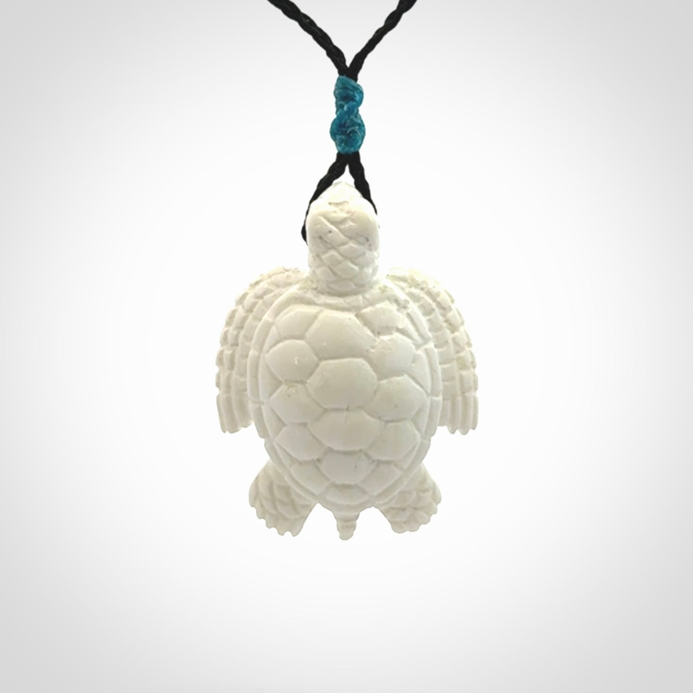 Hand carved white onyx turtle pendant. Unique handmade jewellery for sale online.