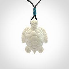 Hand carved white onyx turtle pendant. Unique handmade jewellery for sale online.