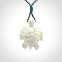 Hand carved white onyx turtle pendant. Unique handmade jewellery for sale online.