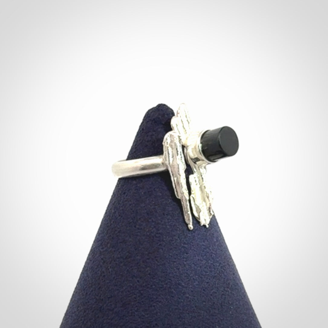 This is a handcrafted New Zealand Pounamu, Jade and sterling silver ring